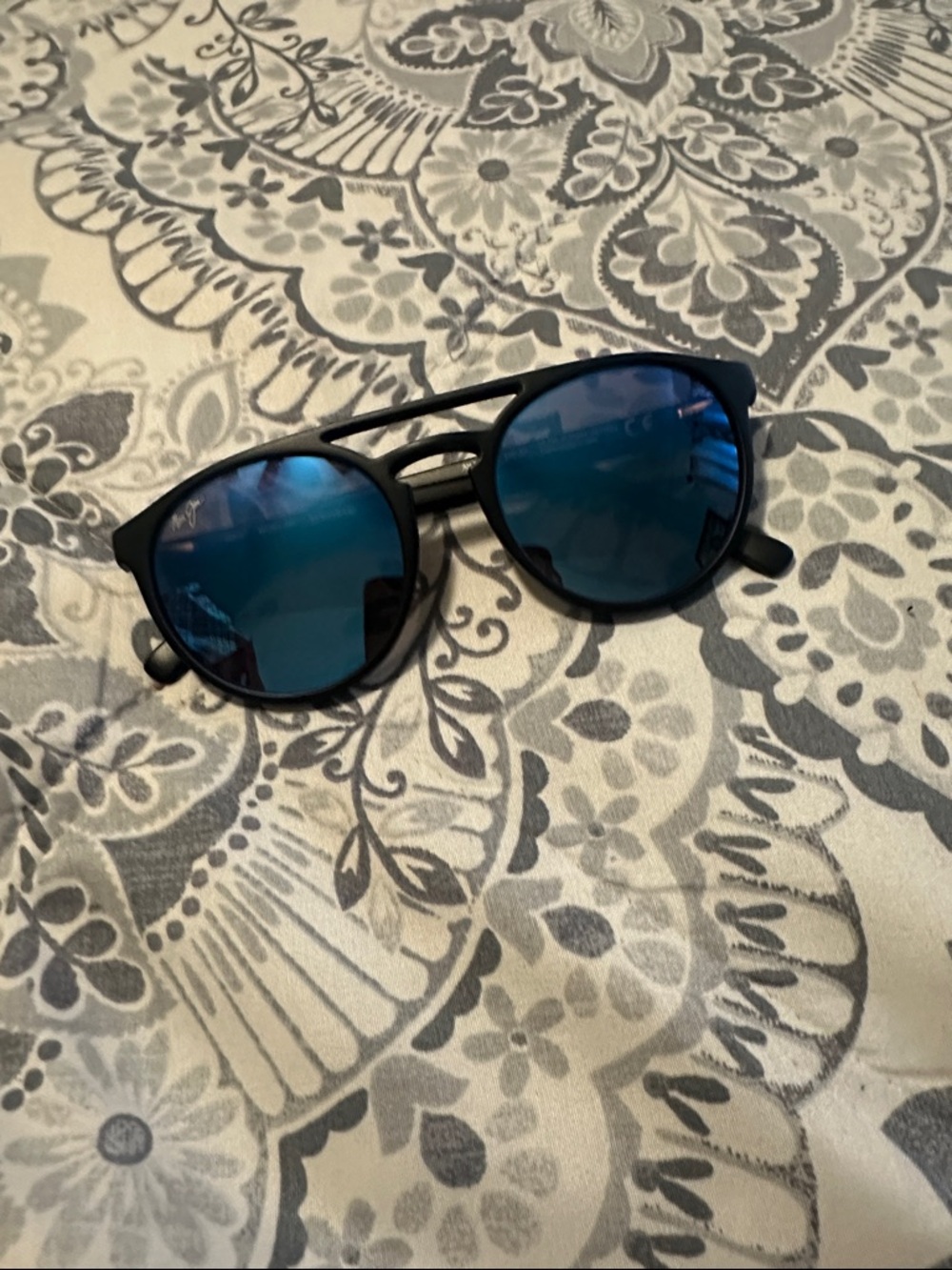 Maui Jim Black Frame Sunglasses with Blue Mirrored Lenses